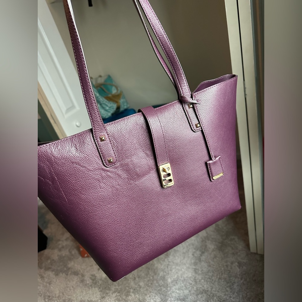 Beautiful gently used Michael Kors bag in purple